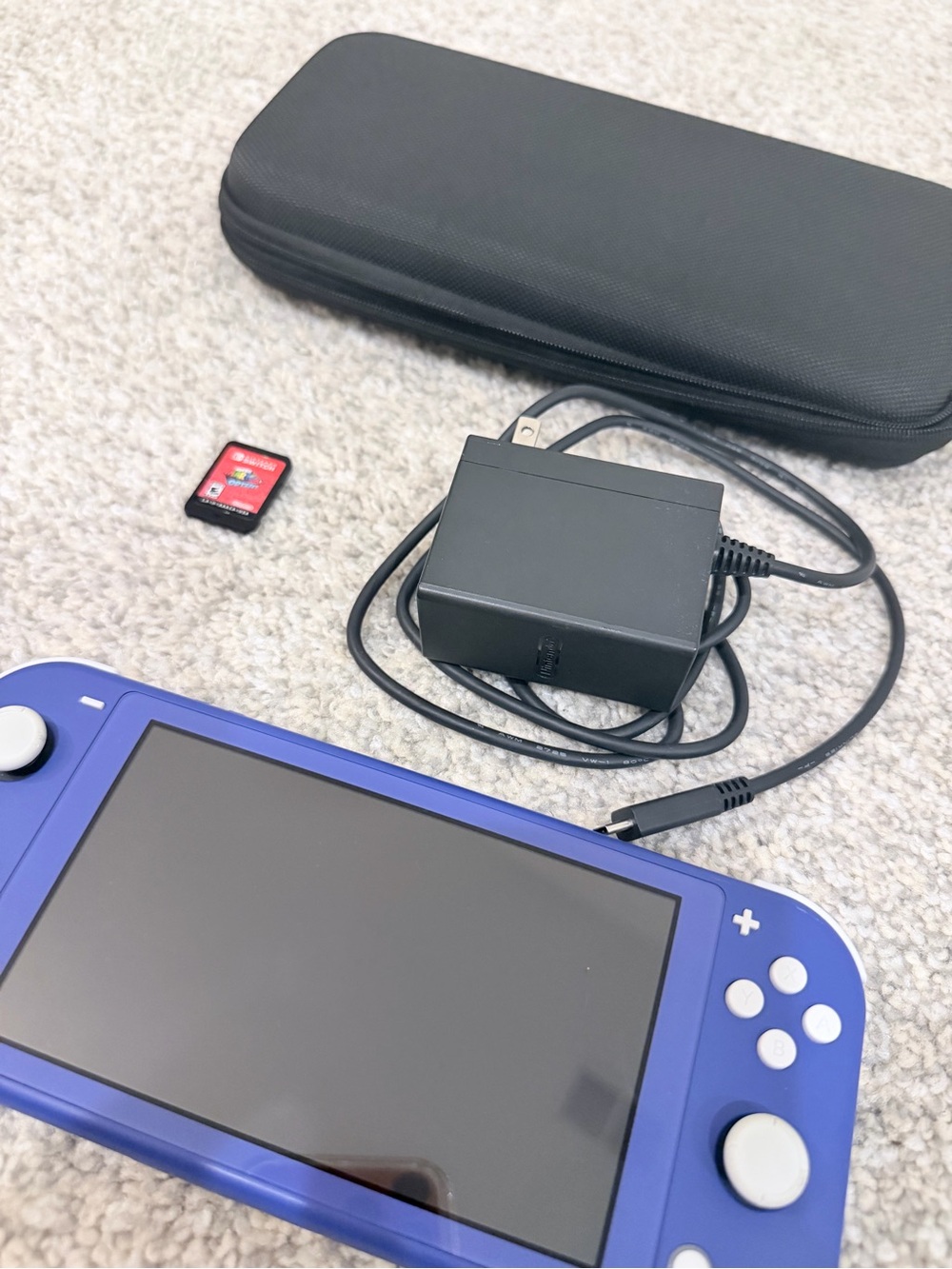 Perfectly Working Nintendo Switch Lite + Super Mario Odyssey + Case + Charger